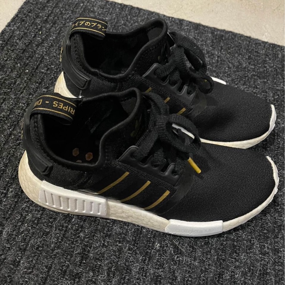 Adidas NMDs (black and gold)